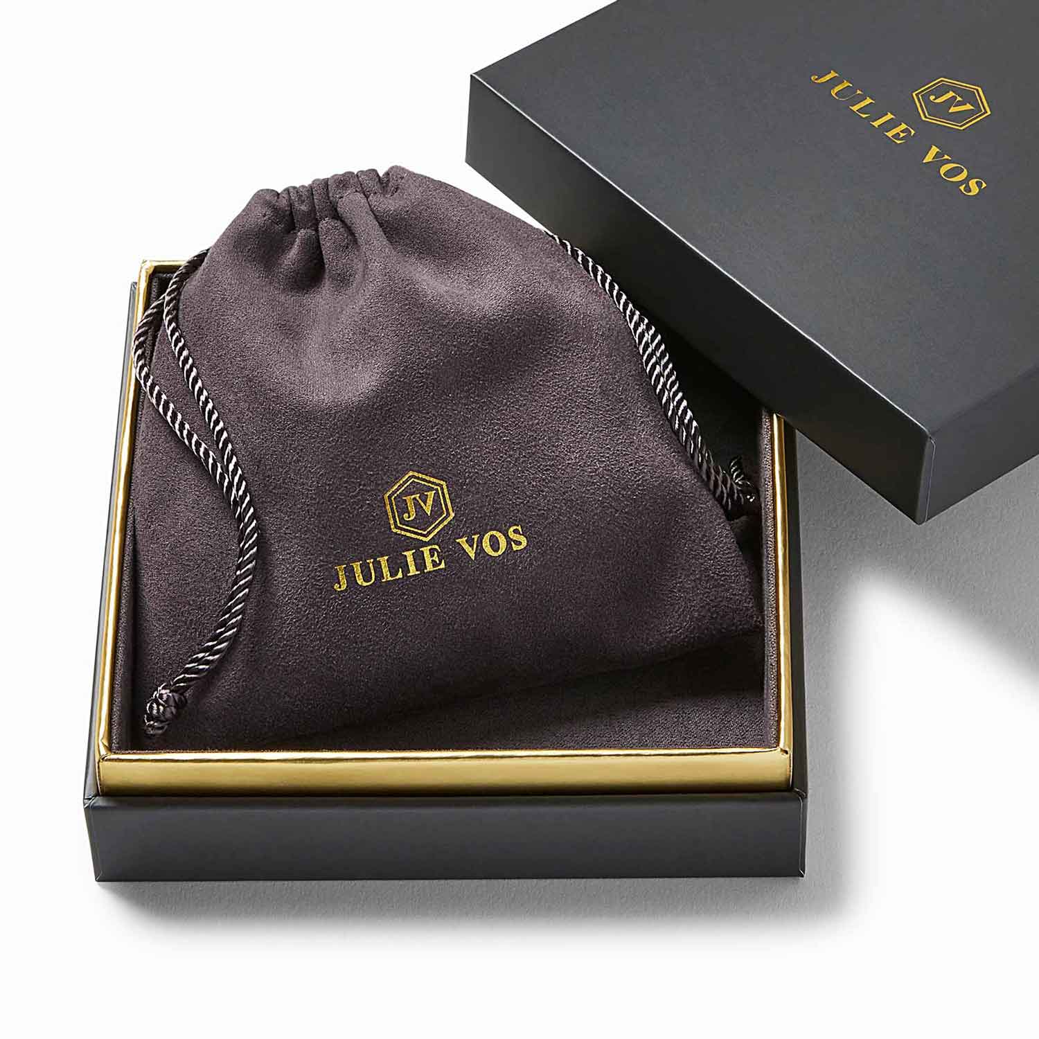Jewelry box with a necklace inside, branded 'Julie Vos'.